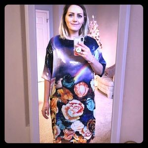Shiny black dress with flowers and a rainbow